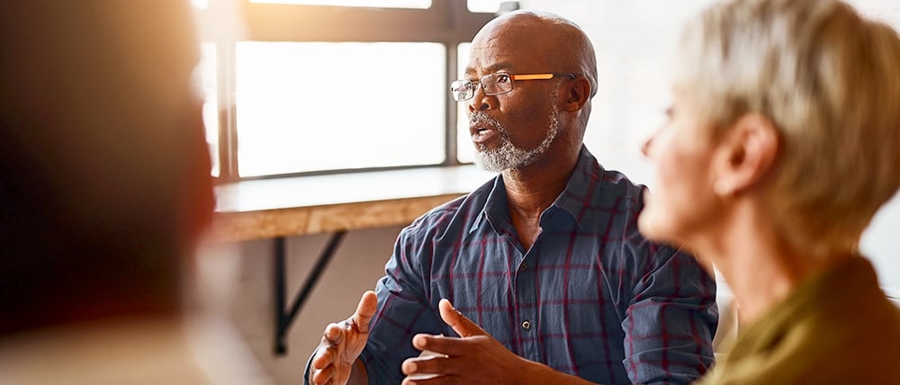 Man-Speaking-group-discussion