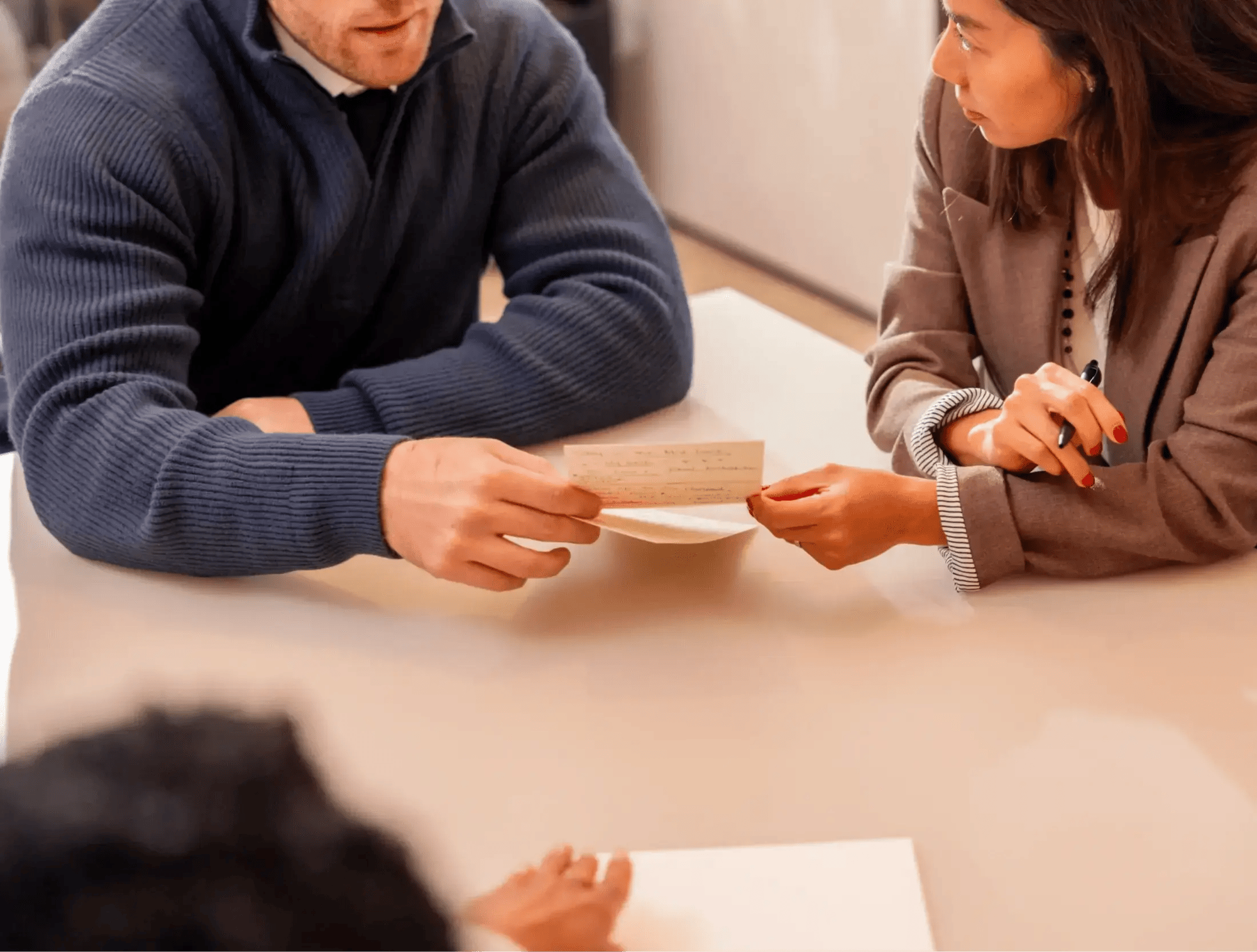 Business-people-sharing-notes-1_Feb-26-1 Business-people-sharing-notes-1_Feb-26-1