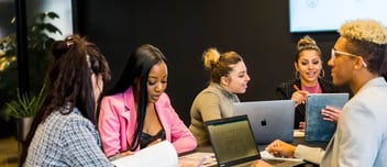 Colleagues collaborating around a table