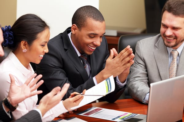Multi ethnic business team at a meeting. Interacting. Focus on african-american man-1