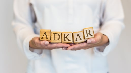 adkar-model-blocks-on-man-hands