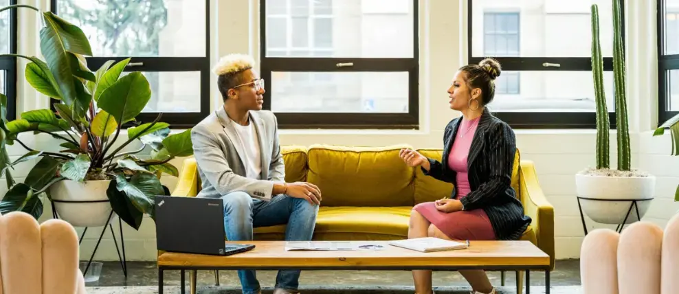 Two people discussing the Bridges’ transition model